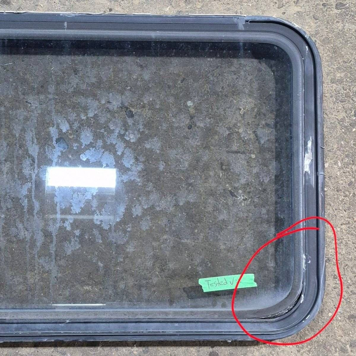 Used Black Radius Emergency Opening Window - 35 1/8