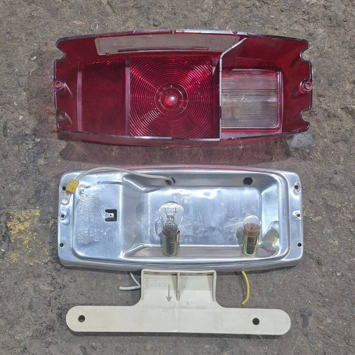 Used Miro-Flex RV Tail Light Assembly, With License Plate Bracket,  10 1/8