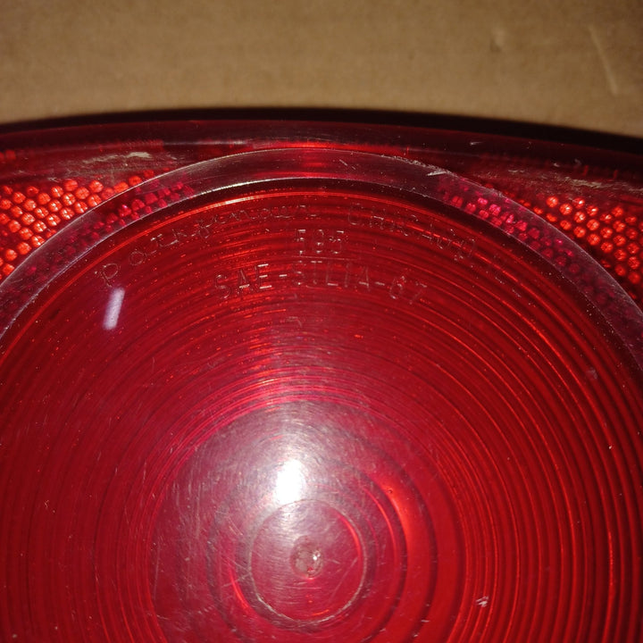 Used 595 SAE-STLIA-67 Tail Light Replacement Lens - Young Farts RV Parts