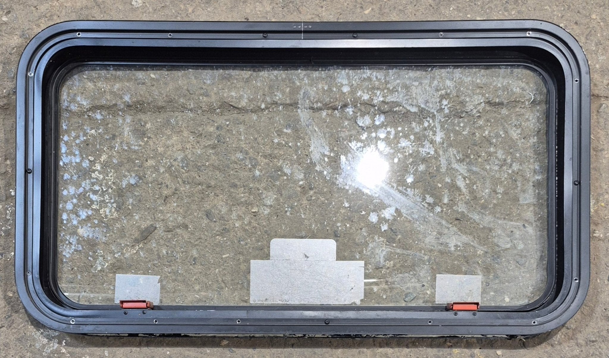 Used Black Emergency Radius Opening Window : 35 1/2" W x 18 3/4" H x 1 7/8" - Young Farts RV Parts