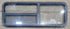 Used Black Emergency Radius Opening Window : 59 1/4" W x 21 1/4" H x 1 7/8" - Young Farts RV Parts