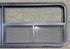 Used Black Emergency Radius Opening Window : 59 1/4" W x 21 1/4" H x 1 7/8" - Young Farts RV Parts