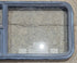 Used Black Emergency Radius Opening Window : 59 1/4" W x 21 1/4" H x 1 7/8" - Young Farts RV Parts