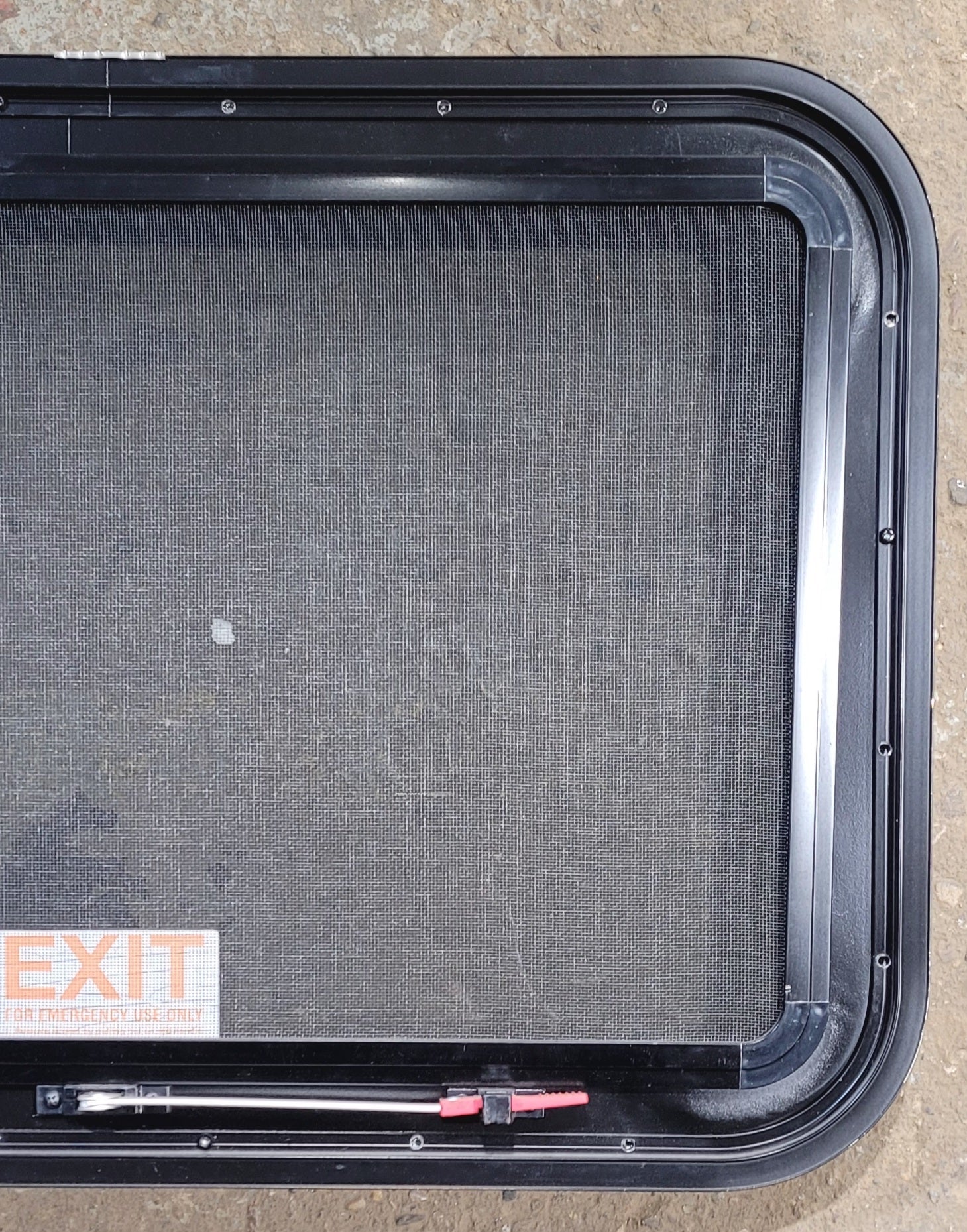 Used Black Radius Emergency Opening Window : 29 1/2" W x 19 1/4" H x 1 7/8" - Young Farts RV Parts