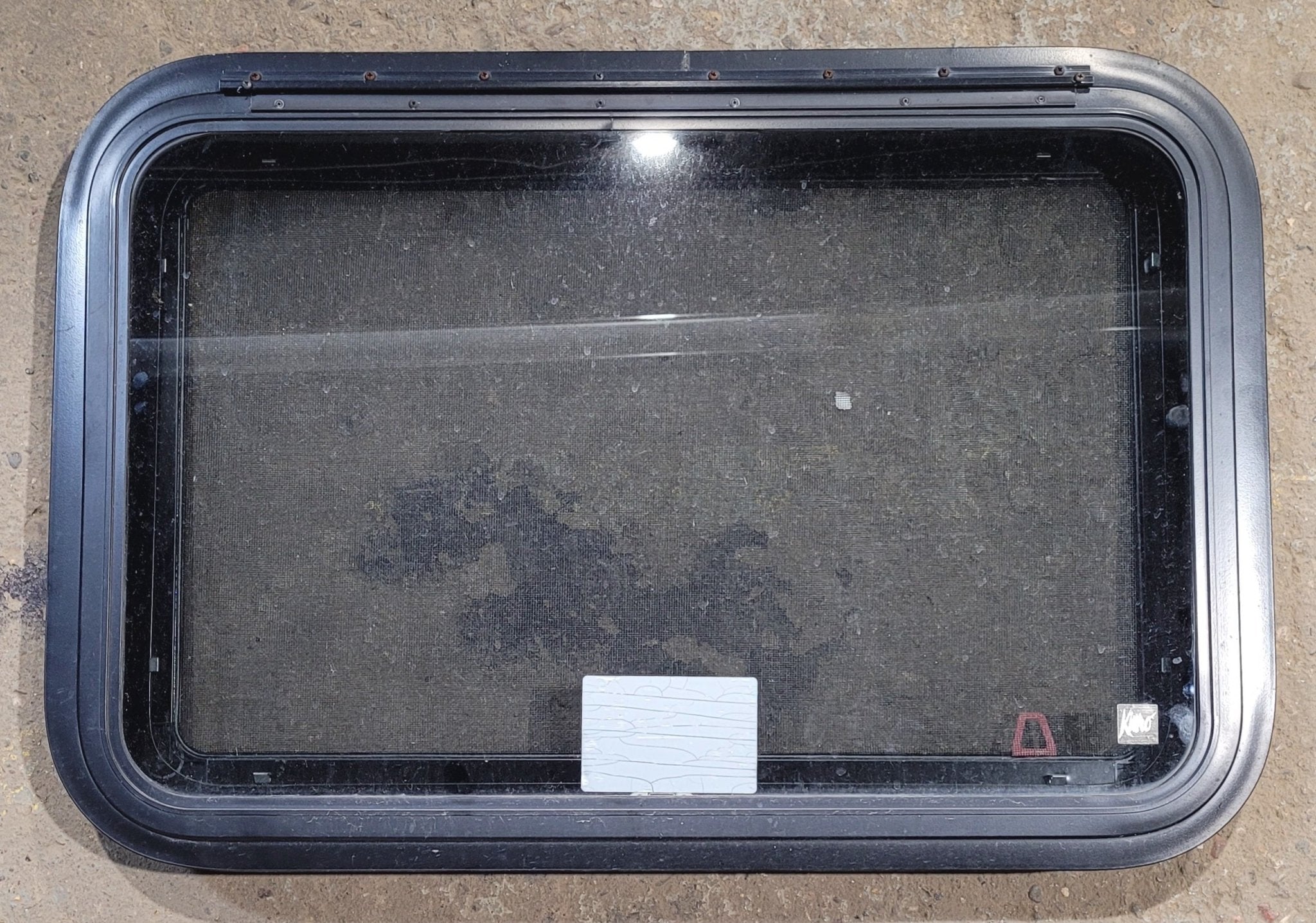 Used Black Radius Emergency Opening Window : 29 1/2" W x 19 1/4" H x 1 7/8" - Young Farts RV Parts