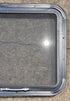 Used Black Radius Emergency Opening Window : 29 1/2" W x 21 1/2" H x 1 1/2" - Young Farts RV Parts