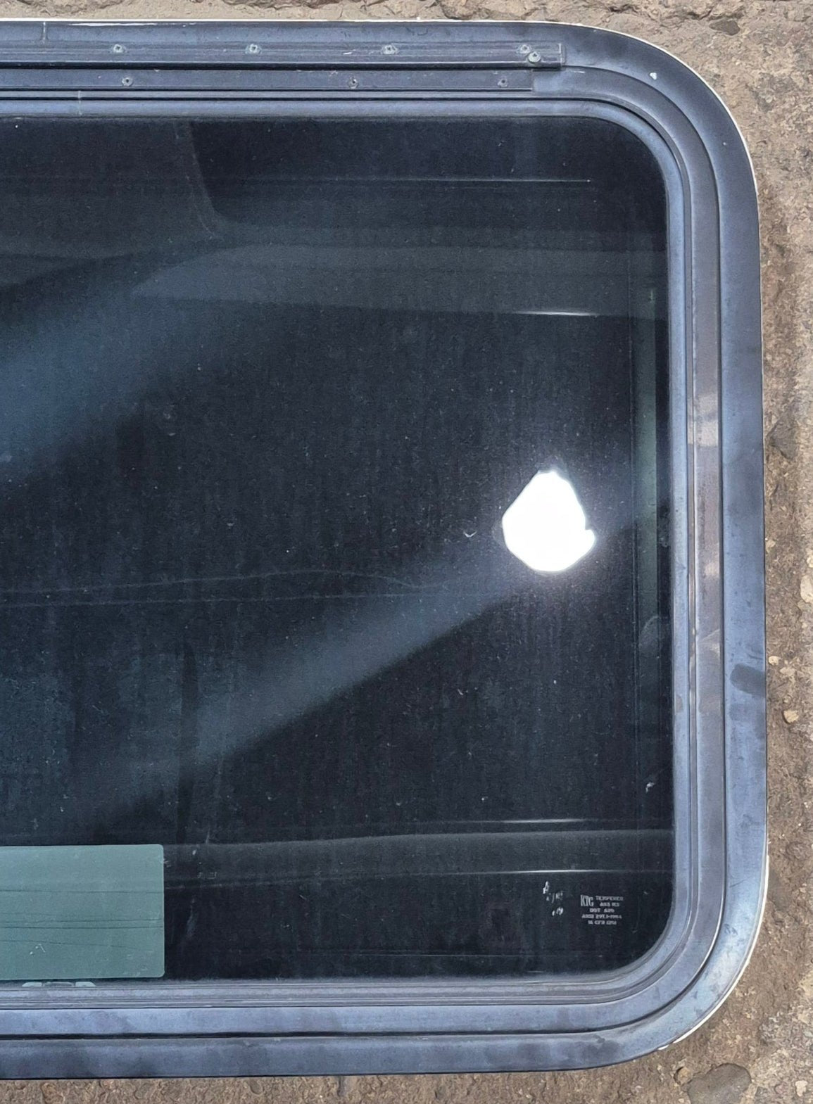 Used Black Radius Emergency Opening Window : 29 1/2" W x 21 1/2" H x 1 3/4" - Young Farts RV Parts