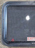 Used Black Radius Emergency Opening Window : 29 1/2" W x 21 1/2" H x 1 3/4" - Young Farts RV Parts