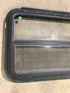 Used Black Radius Emergency Opening Window : 29 1/2" W x 21 1/2" H x 1 7/8" D - Young Farts RV Parts