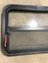 Used Black Radius Emergency Opening Window : 29 1/2" W x 21 1/2" H x 1 7/8" D - Young Farts RV Parts