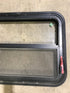Used Black Radius Emergency Opening Window : 29 1/2" W x 21 1/2" H x 1 7/8" D - Young Farts RV Parts