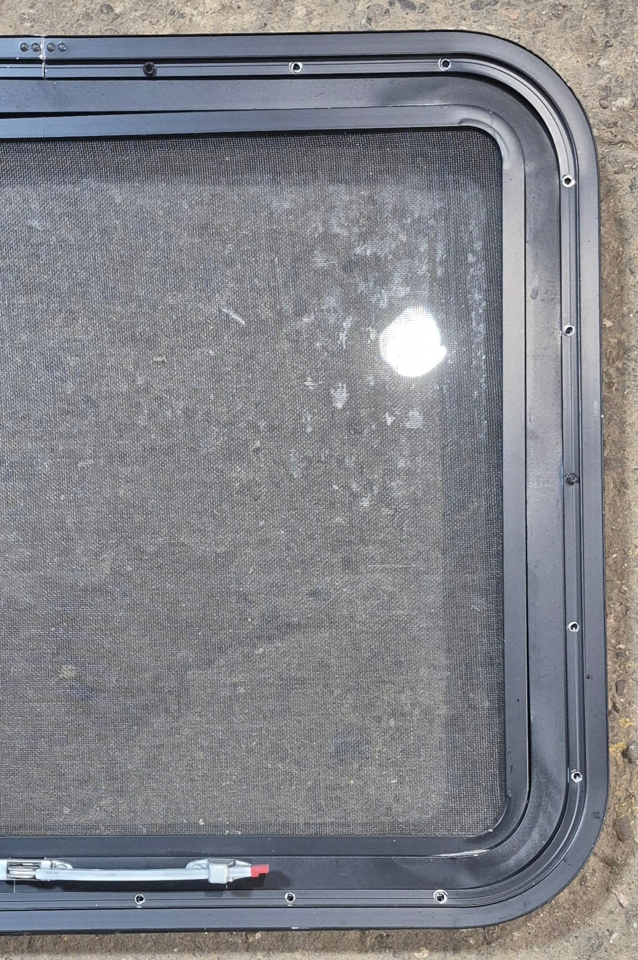 Used Black Radius Emergency Opening Window : 29 1/2" W x 22 1/2" H x 1 3/4" - Young Farts RV Parts