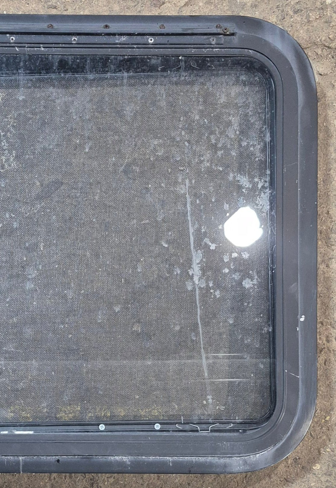 Used Black Radius Emergency Opening Window : 29 1/2" W x 22 1/2" H x 1 3/4" - Young Farts RV Parts