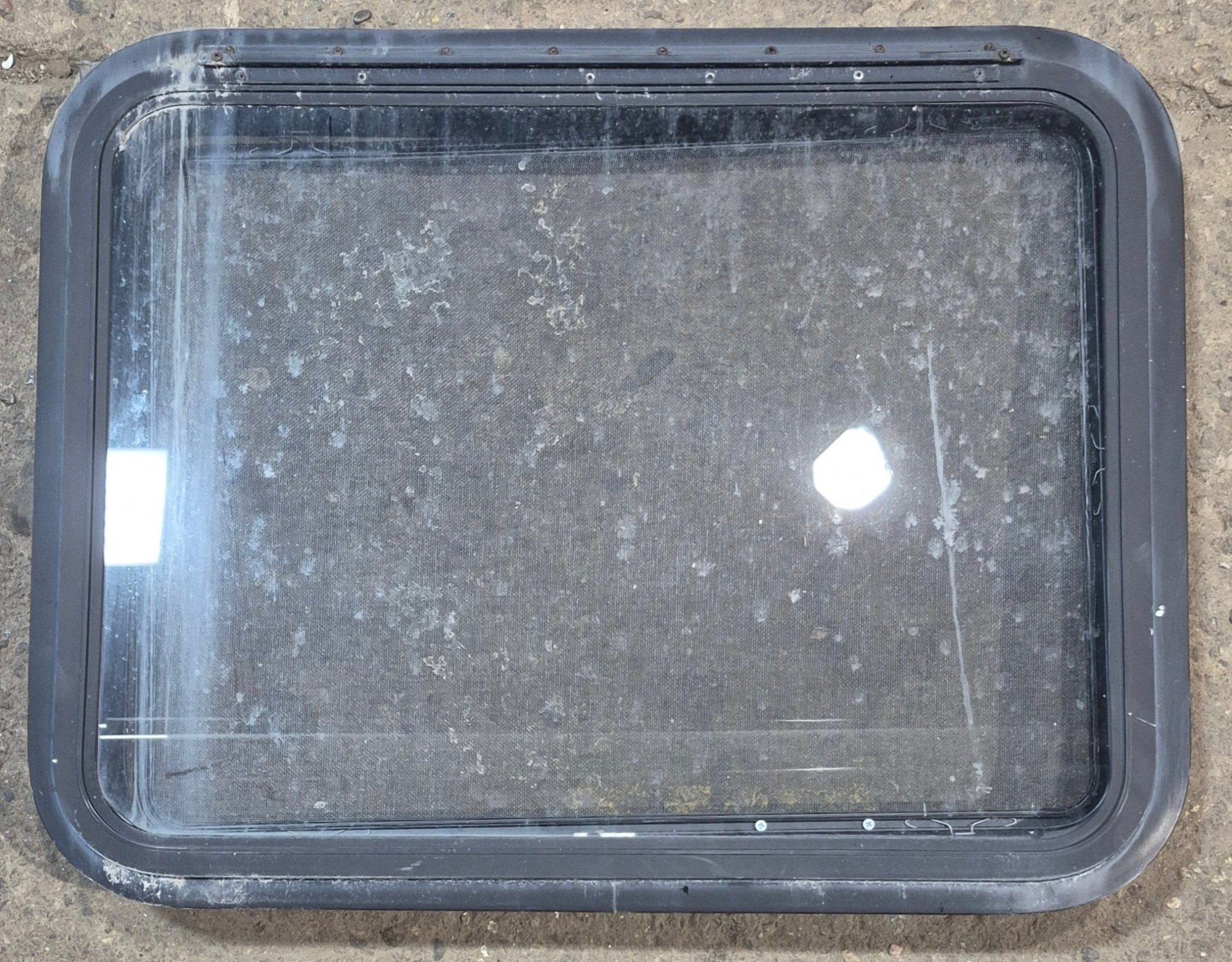 Used Black Radius Emergency Opening Window : 29 1/2" W x 22 1/2" H x 1 3/4" - Young Farts RV Parts