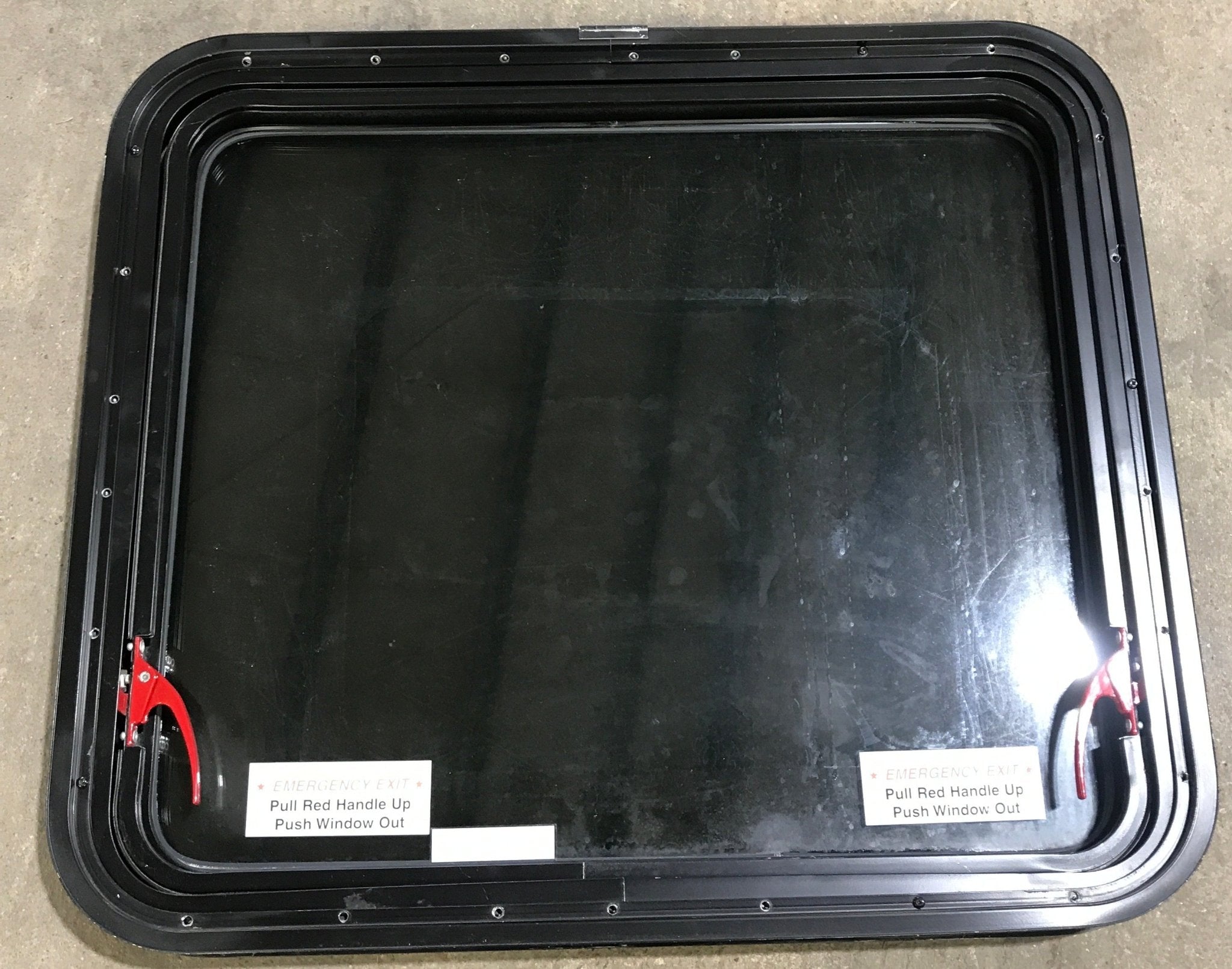 Used Black Radius Emergency Opening Window : 29 1/2" W x 25 1/2" H x 1 7/8" D - Young Farts RV Parts
