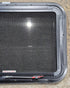 Used Black Radius Emergency Opening Window : 29 1/4" W x 19 1/4" H x 1 1/4" - Young Farts RV Parts