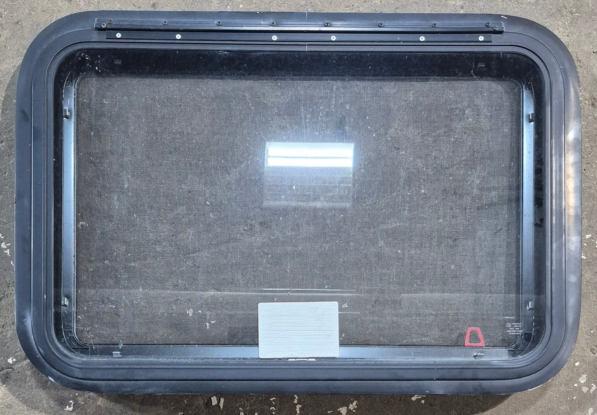 Used Black Radius Emergency Opening Window : 29 1/4" W x 19 1/4" H x 1 3/8" D - Young Farts RV Parts