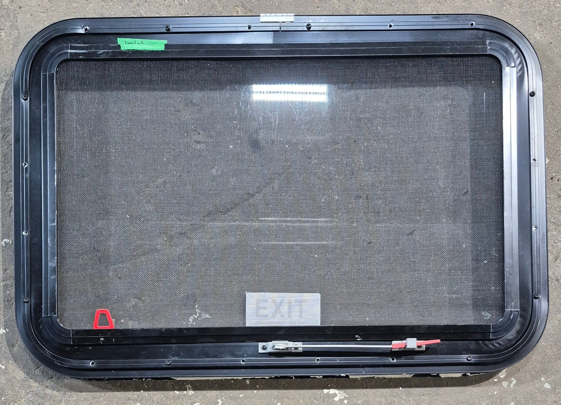 Used Black Radius Emergency Opening Window : 29 1/4" W x 19 1/4" H x 1 3/8" D - Young Farts RV Parts