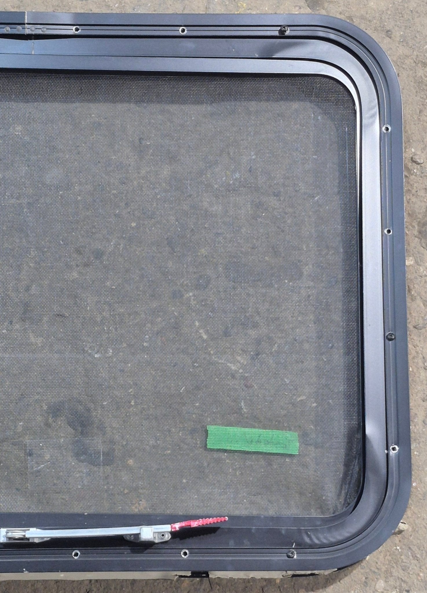 Used Black Radius Emergency Opening Window : 29 1/4" W x 21 1/2" H x 1 7/8" D - Young Farts RV Parts