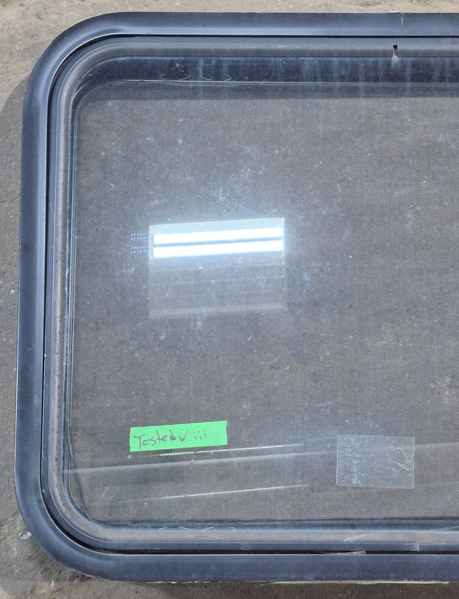 Used Black Radius Emergency Opening Window : 29 1/4" W x 21 1/2" H x 1 7/8" D - Young Farts RV Parts