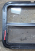 Used Black Radius Emergency Opening Window : 29 1/4" W x 21 1/4" H x 1 1/2" - Young Farts RV Parts