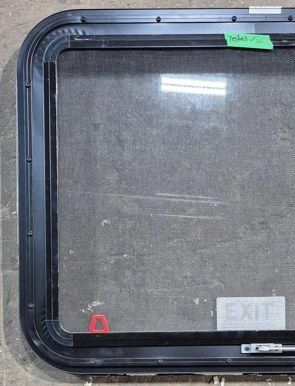 Used Black Radius Emergency Opening Window : 29 1/4" W x 21 1/4" H x 1 1/4" D - Young Farts RV Parts