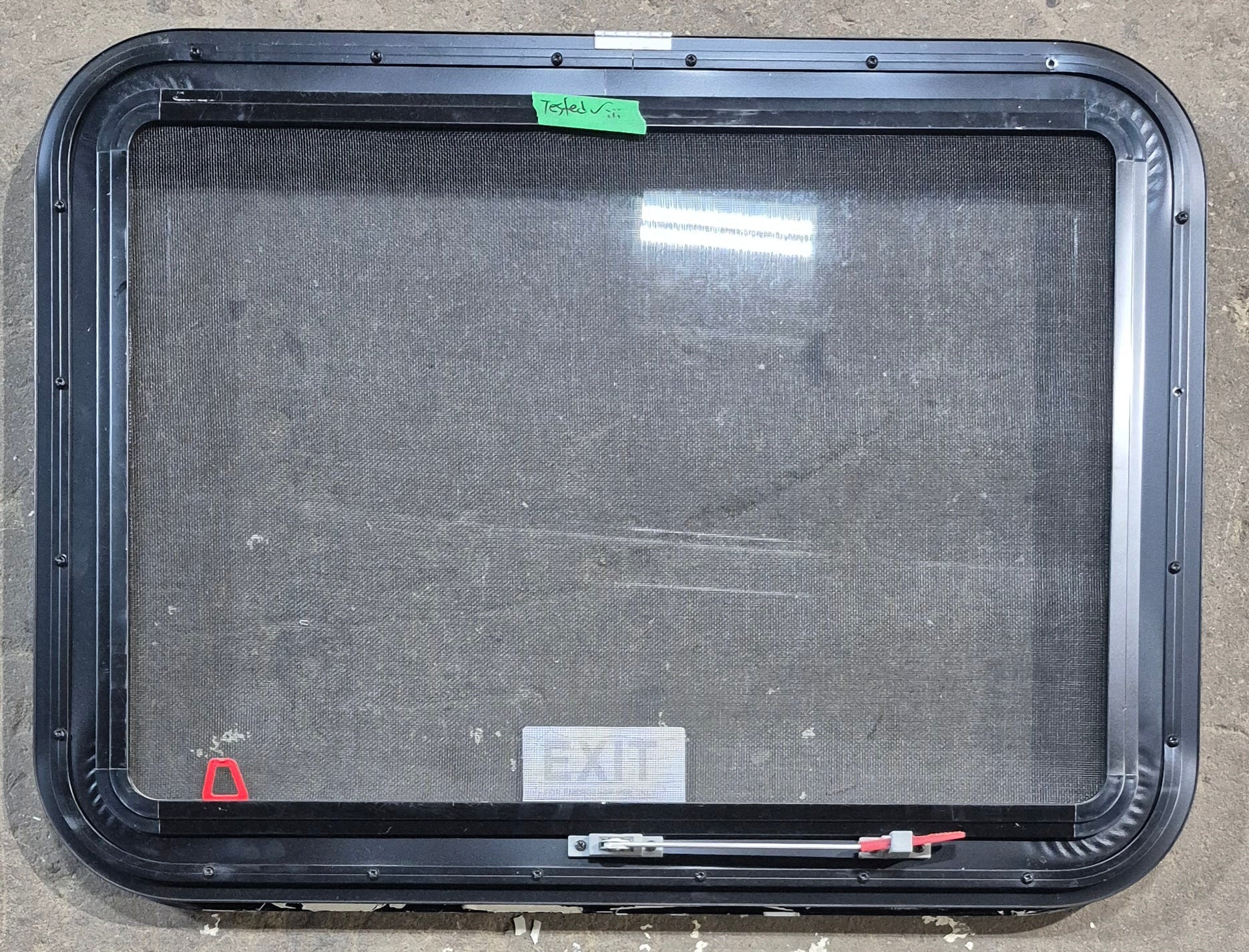 Used Black Radius Emergency Opening Window : 29 1/4" W x 21 1/4" H x 1 1/4" D - Young Farts RV Parts