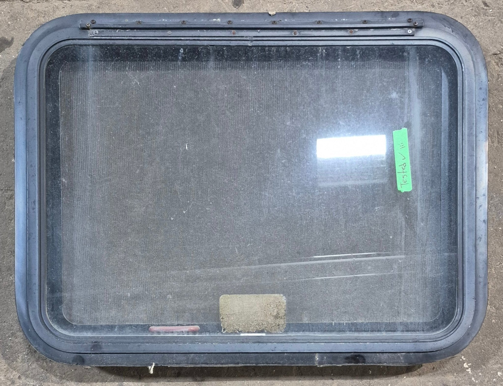 Used Black Radius Emergency Opening Window : 29 1/4" W x 21 1/4" H x 1 7/8" D - Young Farts RV Parts