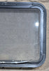 Used Black Radius Emergency Opening Window : 29 1/4" W x 21 1/4" H x 1 7/8" D - Young Farts RV Parts