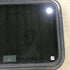 Used Black Radius Emergency Opening Window : 29.5" X 19.5" X 1.5" - Young Farts RV Parts