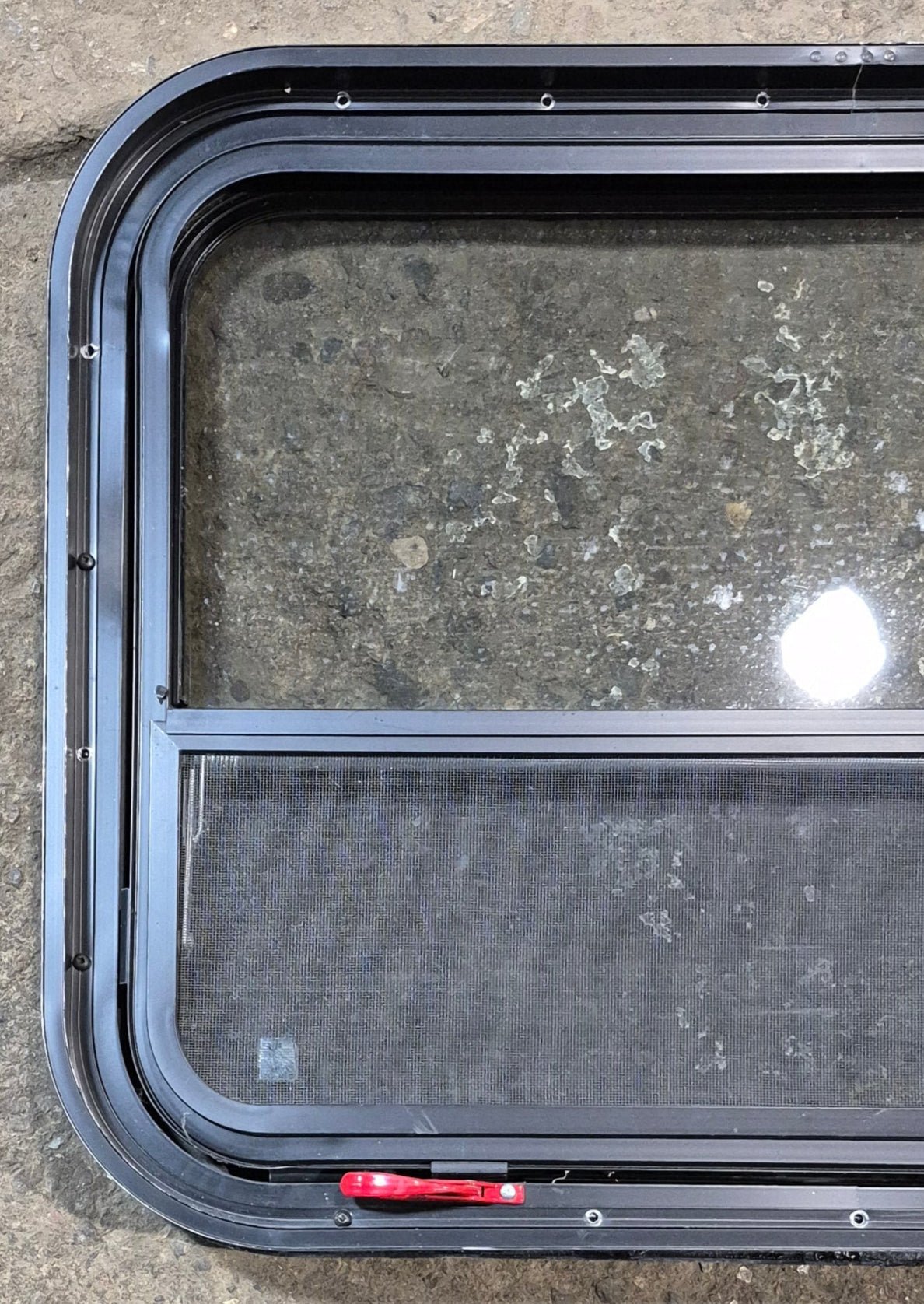 Used Black Radius Emergency Opening Window : 31 1/2" W x 23 1/2" H x 1 7/8" - Young Farts RV Parts