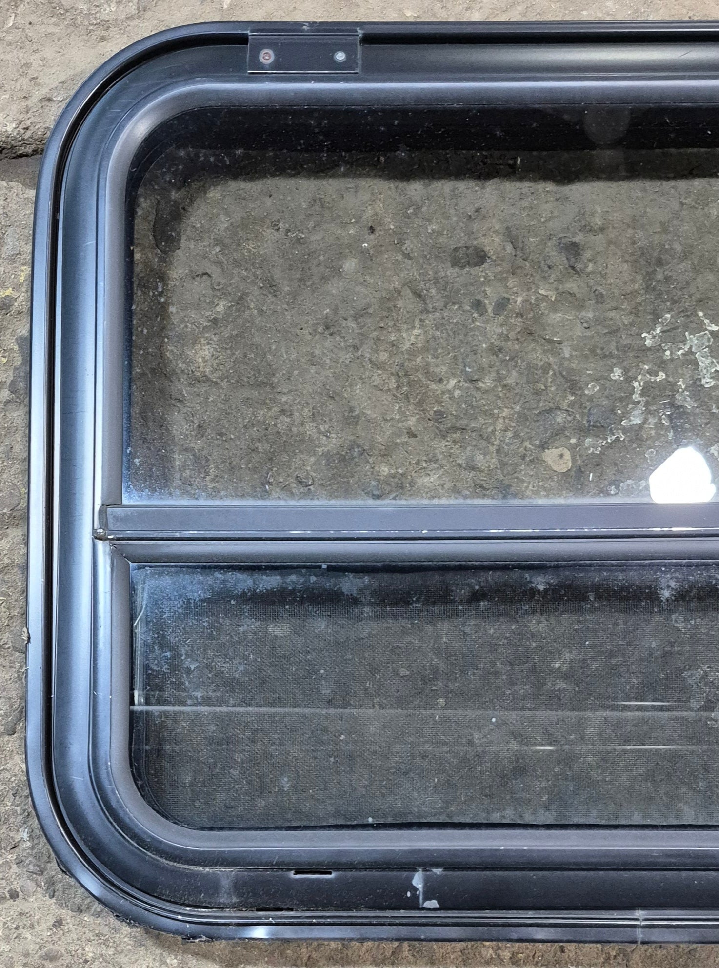 Used Black Radius Emergency Opening Window : 31 1/2" W x 23 1/2" H x 1 7/8" - Young Farts RV Parts