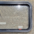 Used Black Radius Emergency Opening Window : 35 1/2" W x 18 1/2" H x 1 7/8" - Young Farts RV Parts