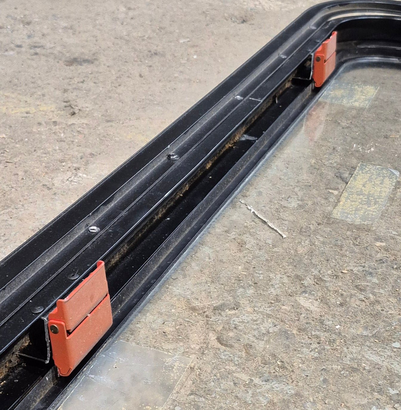 Used Black Radius Emergency Opening Window : 35 1/2" W x 18 1/2" H x 1 7/8" - Young Farts RV Parts