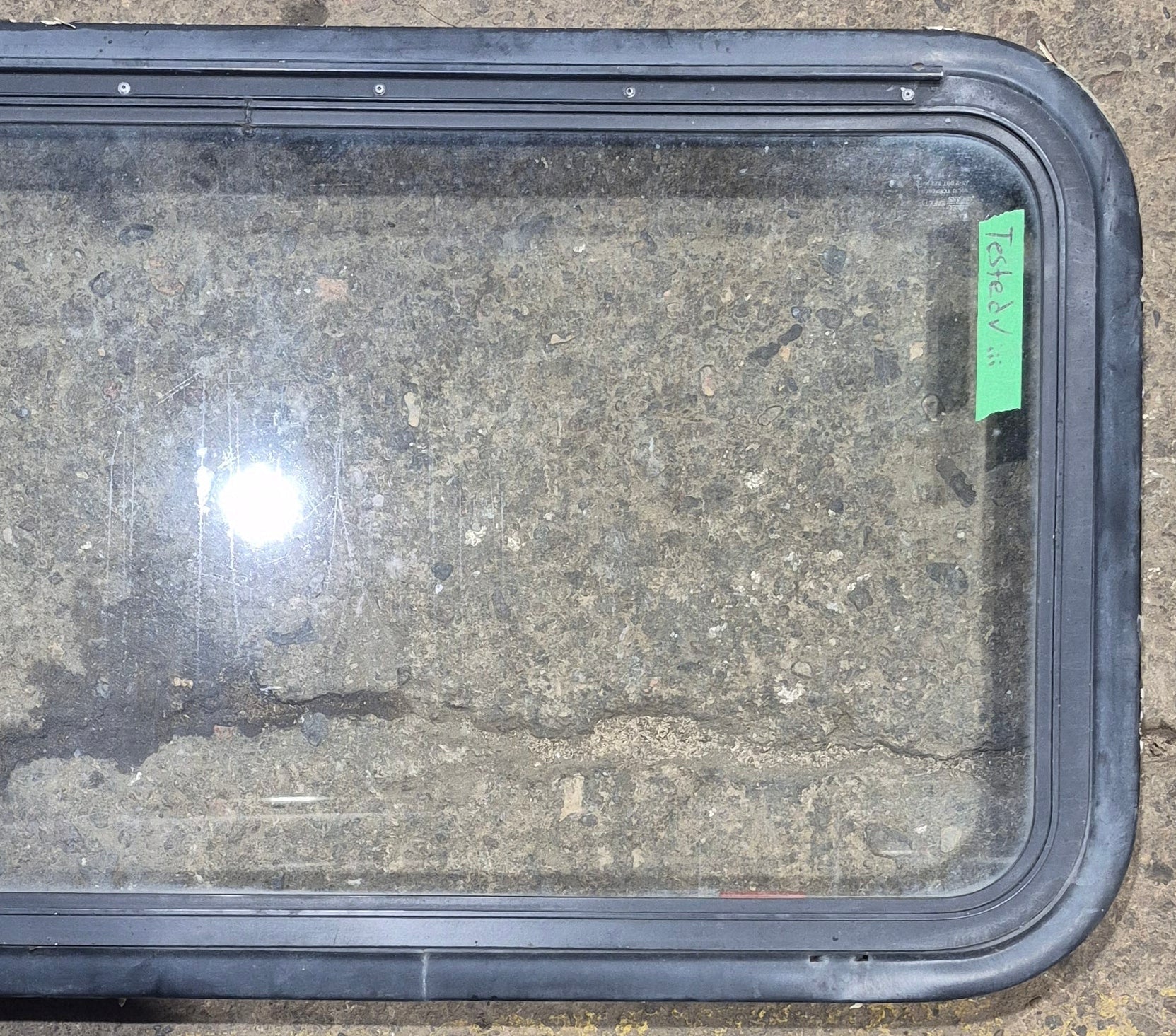 Used Black Radius Emergency Opening Window : 35 1/2" W x 18 3/4" H x 1 7/8" - Young Farts RV Parts