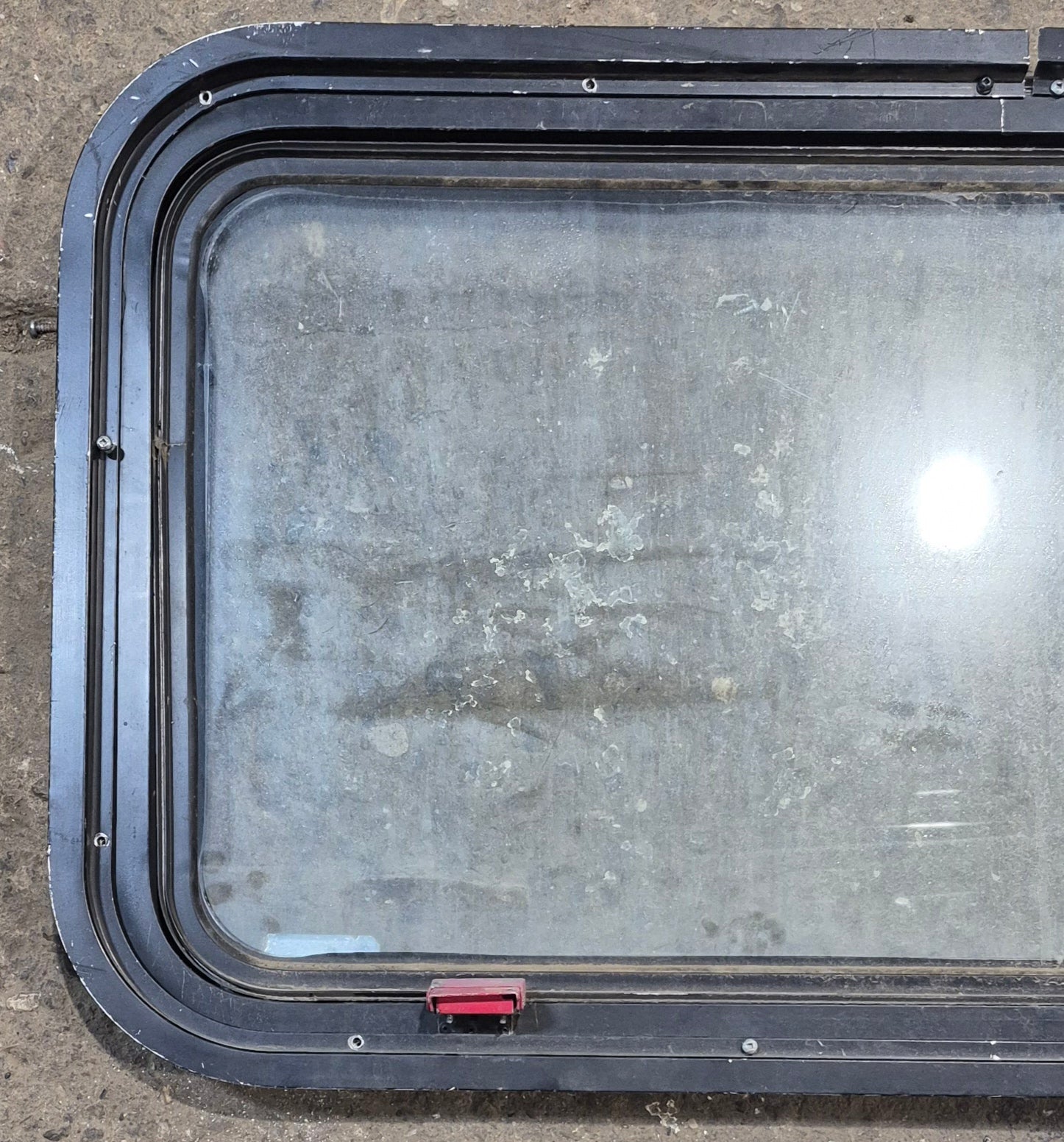 Used Black Radius Emergency Opening Window : 35 1/2" W x 19 1/2" H x 1 1/2" D - Young Farts RV Parts