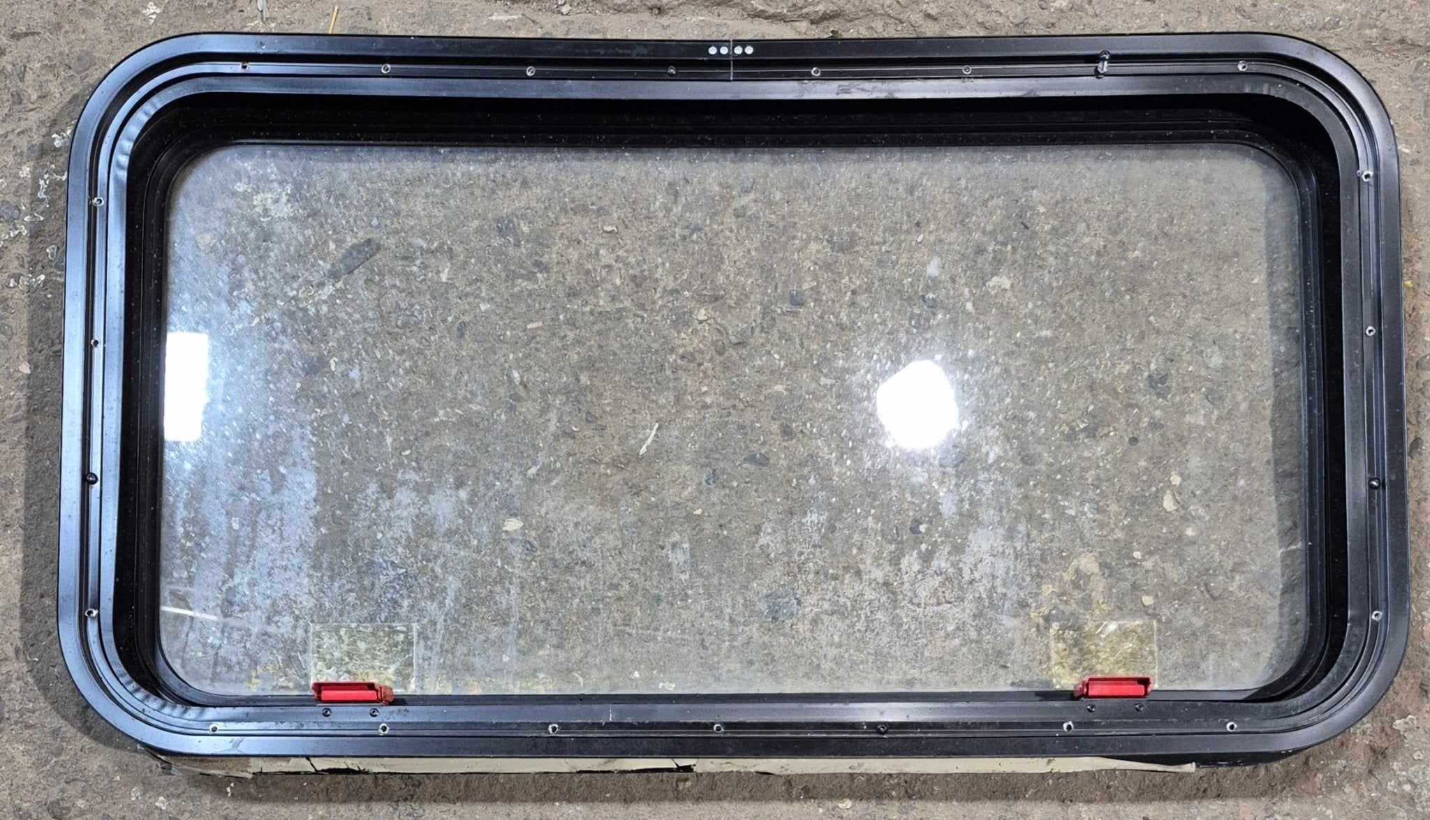 Used Black Radius Emergency Opening Window : 35 1/4" W x 18 1/2" H x 1 7/8" - Young Farts RV Parts