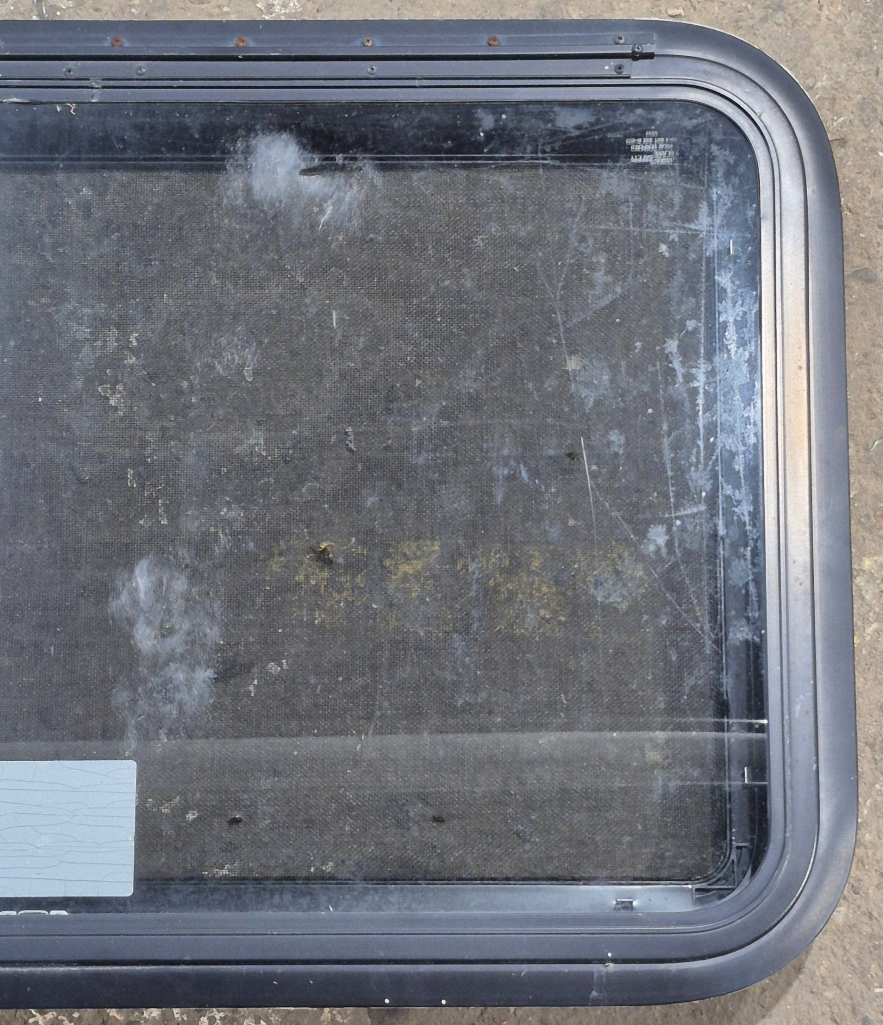 Used Black Radius Emergency Opening Window : 35 1/4" W x 21 1/2" H x 1 3/4" D - Young Farts RV Parts