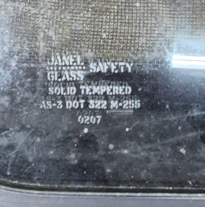 Used Black Radius Emergency Opening Window : 35 1/4" W x 21 1/2" H x 1 3/4" D - Young Farts RV Parts