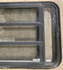 Used Black Radius Emergency Opening Window : 35 1/4" W x 21 1/4" H x 1 7/8" D - Young Farts RV Parts