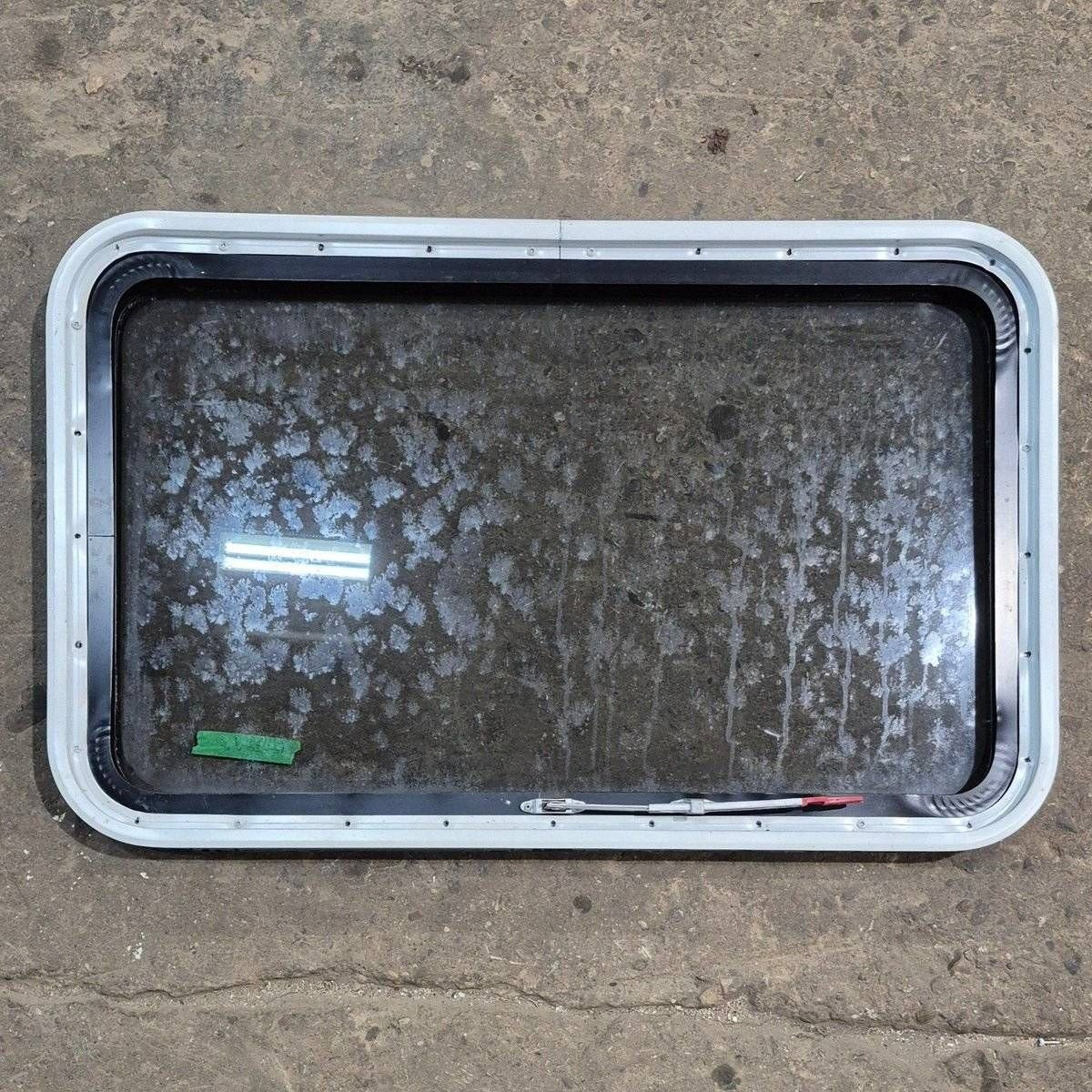 Used Black Radius Emergency Opening Window - 35 1/8