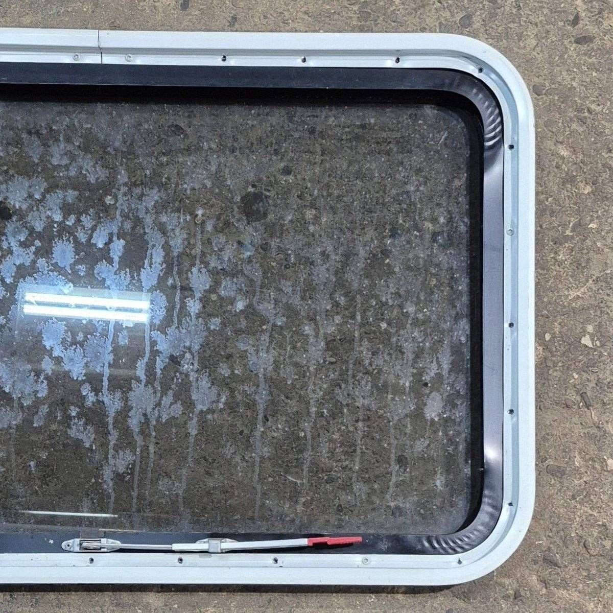 Used Black Radius Emergency Opening Window - 35 1/8