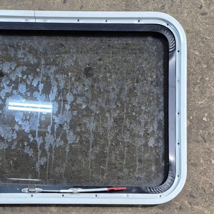 Used Black Radius Emergency Opening Window - 35 1/8" X 21 1/4" X 1 7/8" - Young Farts RV Parts