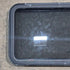 Used Black Radius Emergency Opening Window - 35 1/8" X 21 1/4" X 1 7/8" - Young Farts RV Parts