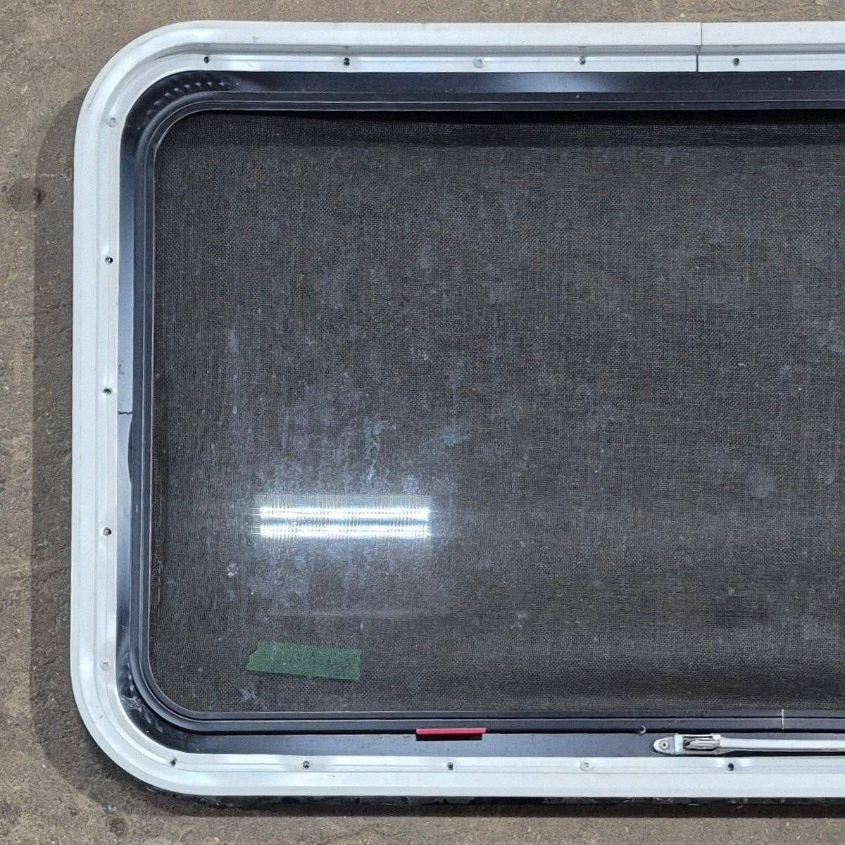 Used Black Radius Emergency Opening Window - 35 1/8