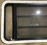 Used Black Radius Emergency Opening Window : 35" W x 21 1/4" H x 1 7/8" D - Young Farts RV Parts