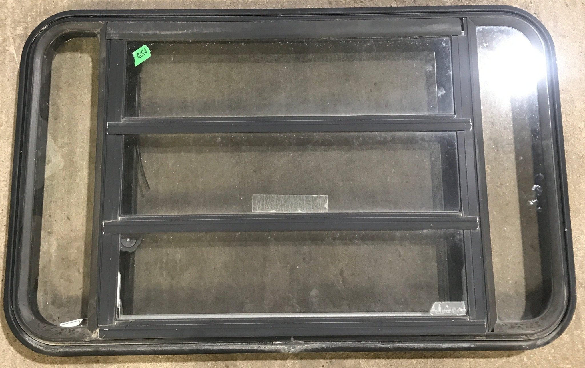 Used Black Radius Emergency Opening Window : 35" W x 21 1/4" H x 1 7/8" D - Young Farts RV Parts