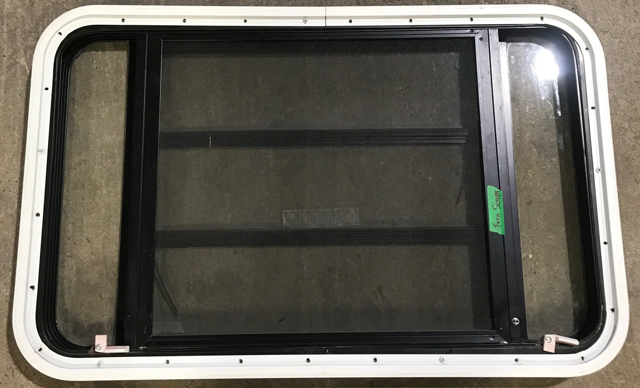 Used Black Radius Emergency Opening Window : 35" W x 21 1/4" H x 1 7/8" D - Young Farts RV Parts
