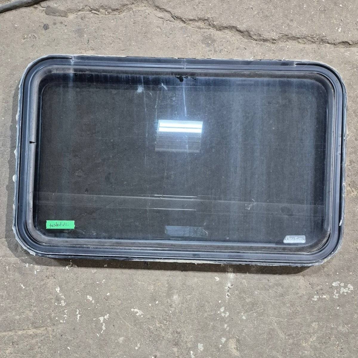 Used Black Radius Emergency Opening Window : 35" X 21.25" X 1.875" - Young Farts RV Parts