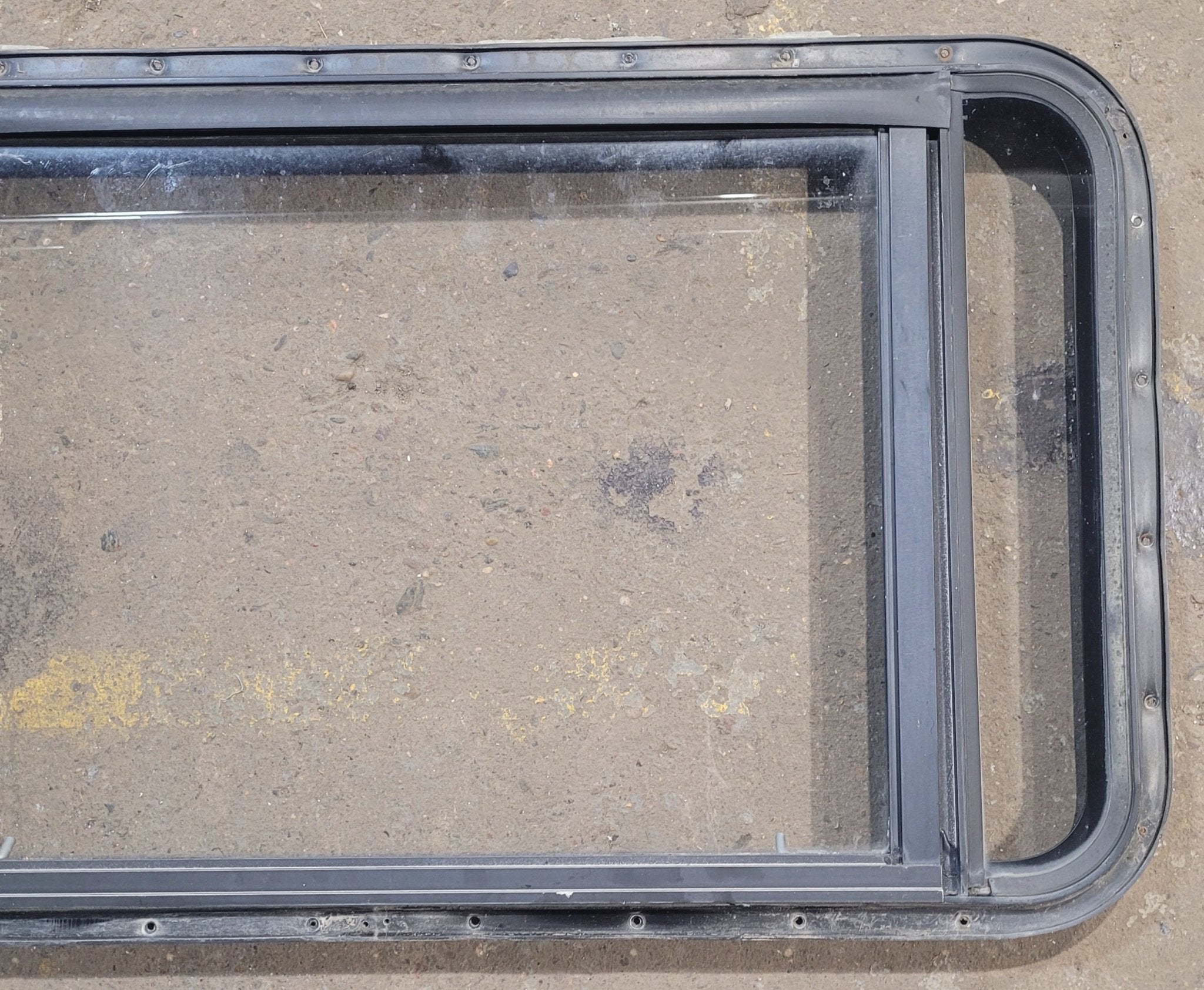 Used Black Radius Emergency Opening Window : 37 3/4" W x 21 3/4" H x 1 3/4" D - Young Farts RV Parts